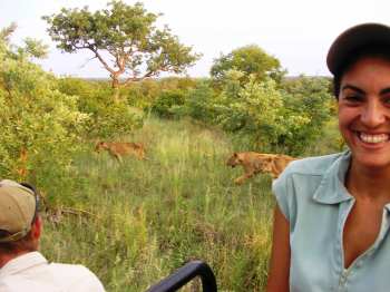 Monique and lions on Singita game drive