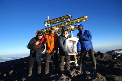 The four of us at the top of Kilimanjaro